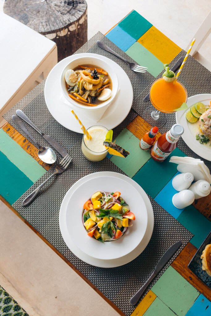 Table with local and international dishes at Cristal Resort, Paje Beach, Zanzibar.