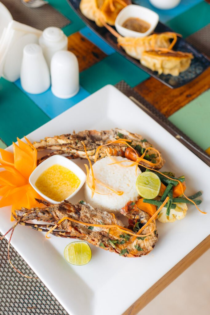 Grilled lobster served at Cristal Resort's beachfront restaurant, Zanzibar.